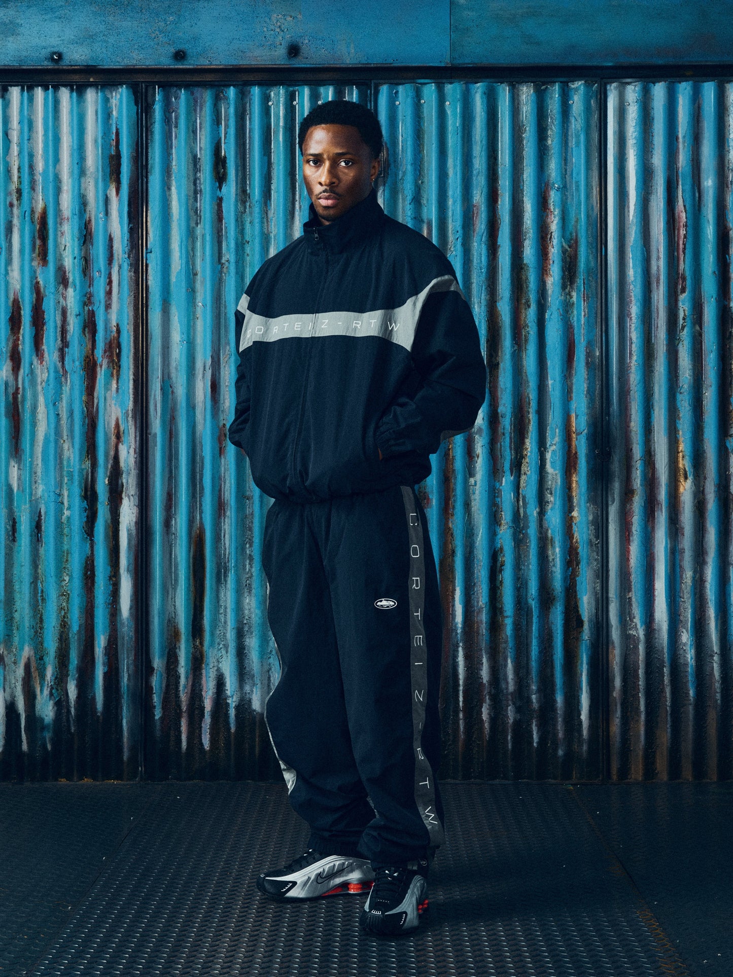 Corteiz Black Nylon Strata Shuku Jacket, close-up of YKK zipper closure