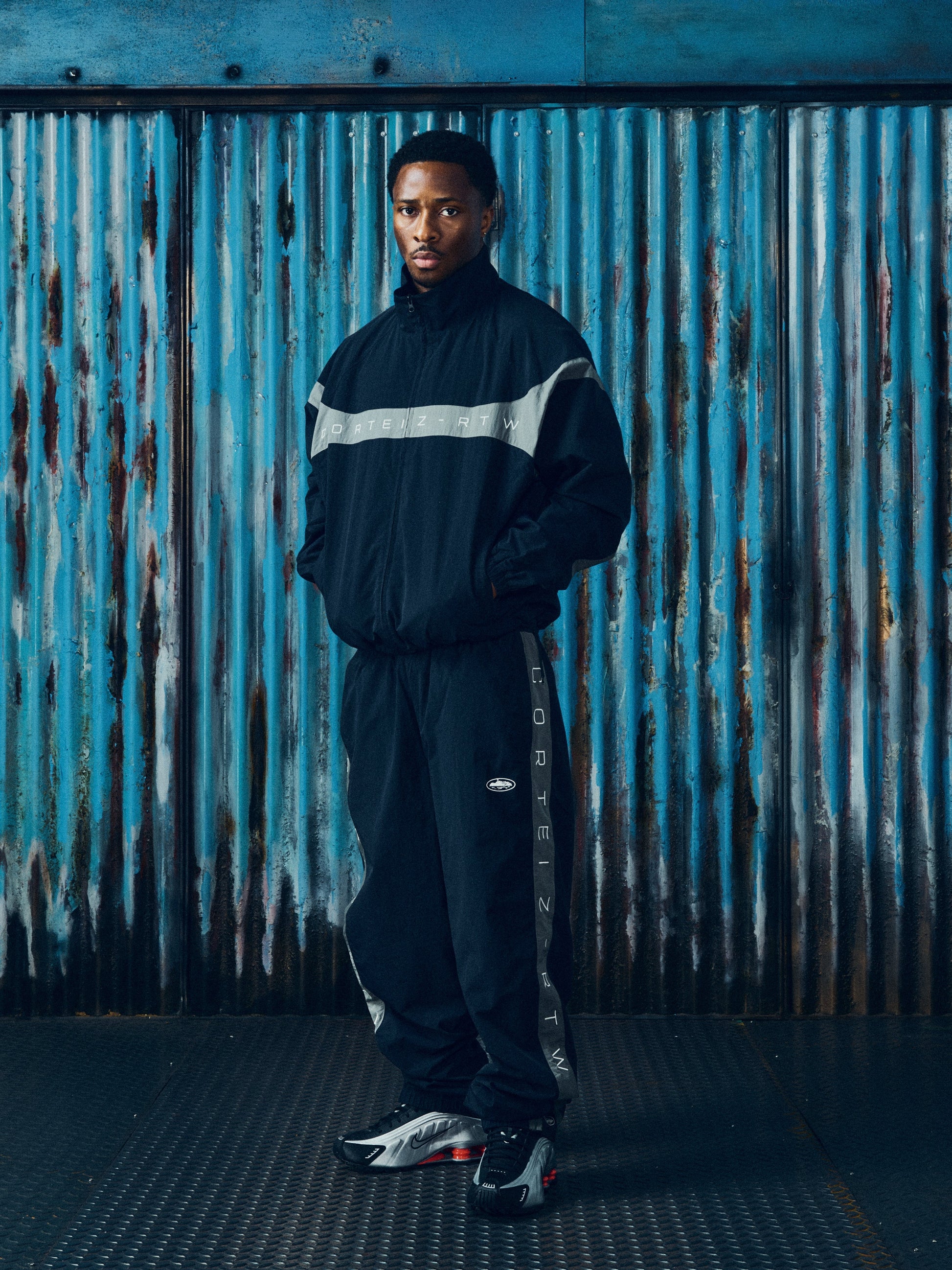 Corteiz Black Nylon Strata Shuku Jacket, close-up of YKK zipper closure