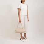 Bag It Elizabeth Pebbled Leather Baguette Bag – Bone