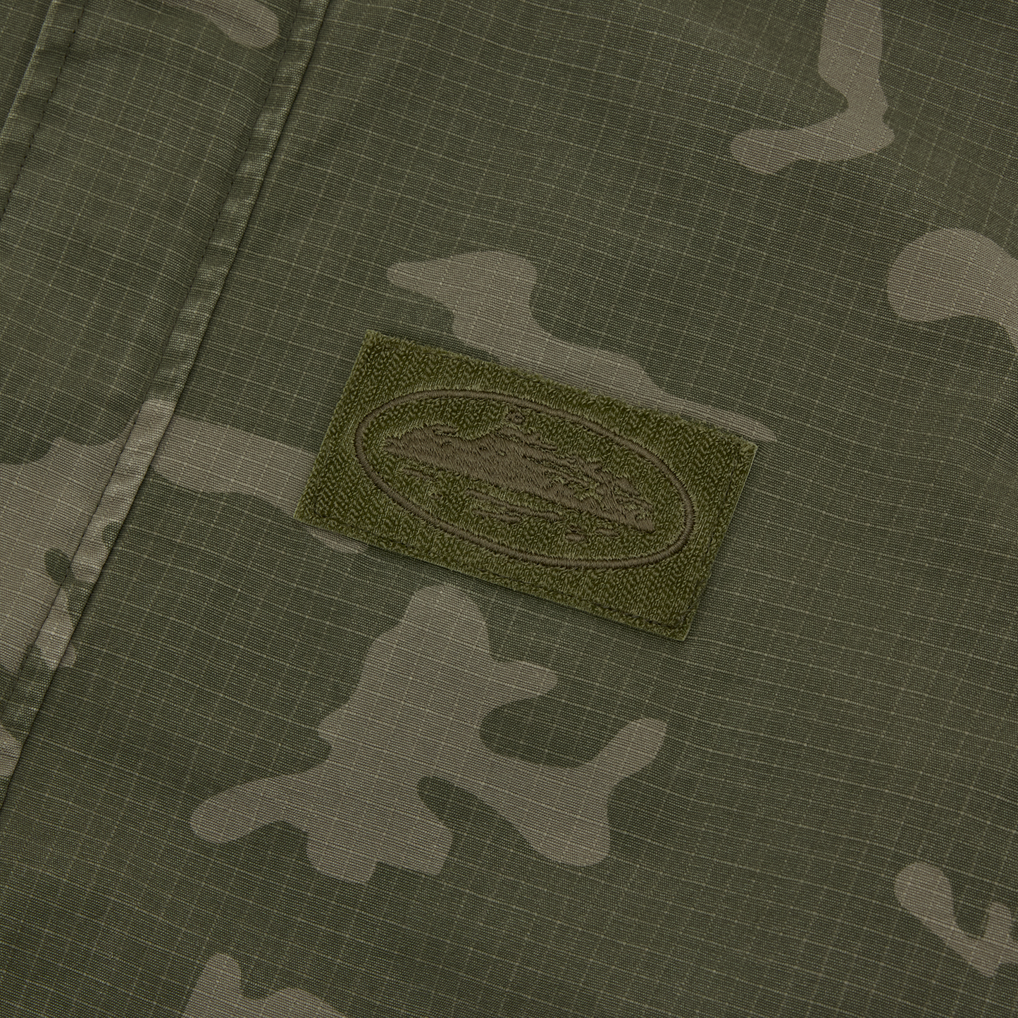 Corteiz Green Cotton Ripstop Guerillaz Jacket, Green Camo, close-up of velcro cuff adjuster
