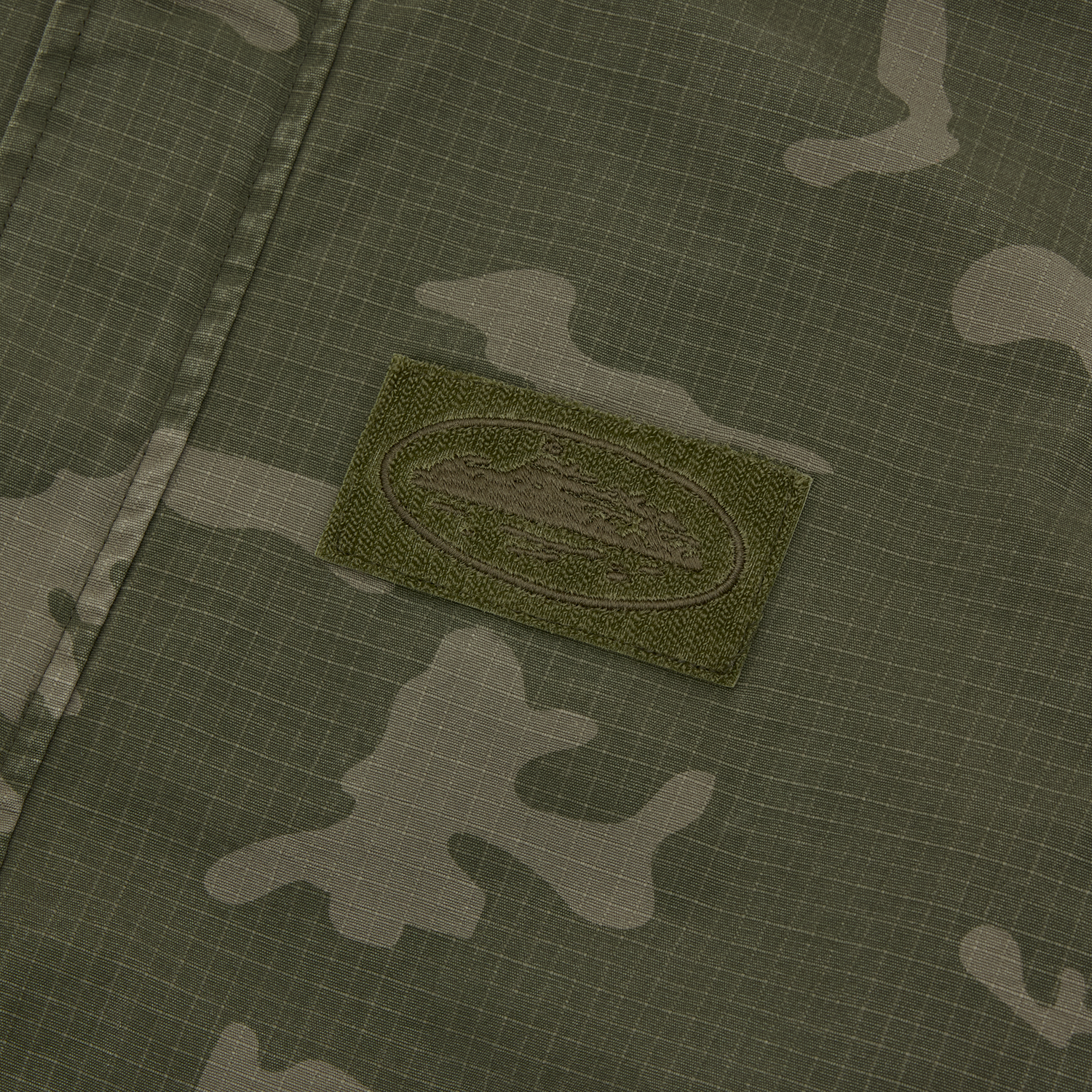 Corteiz Green Cotton Ripstop Guerillaz Jacket, Green Camo, close-up of velcro cuff adjuster