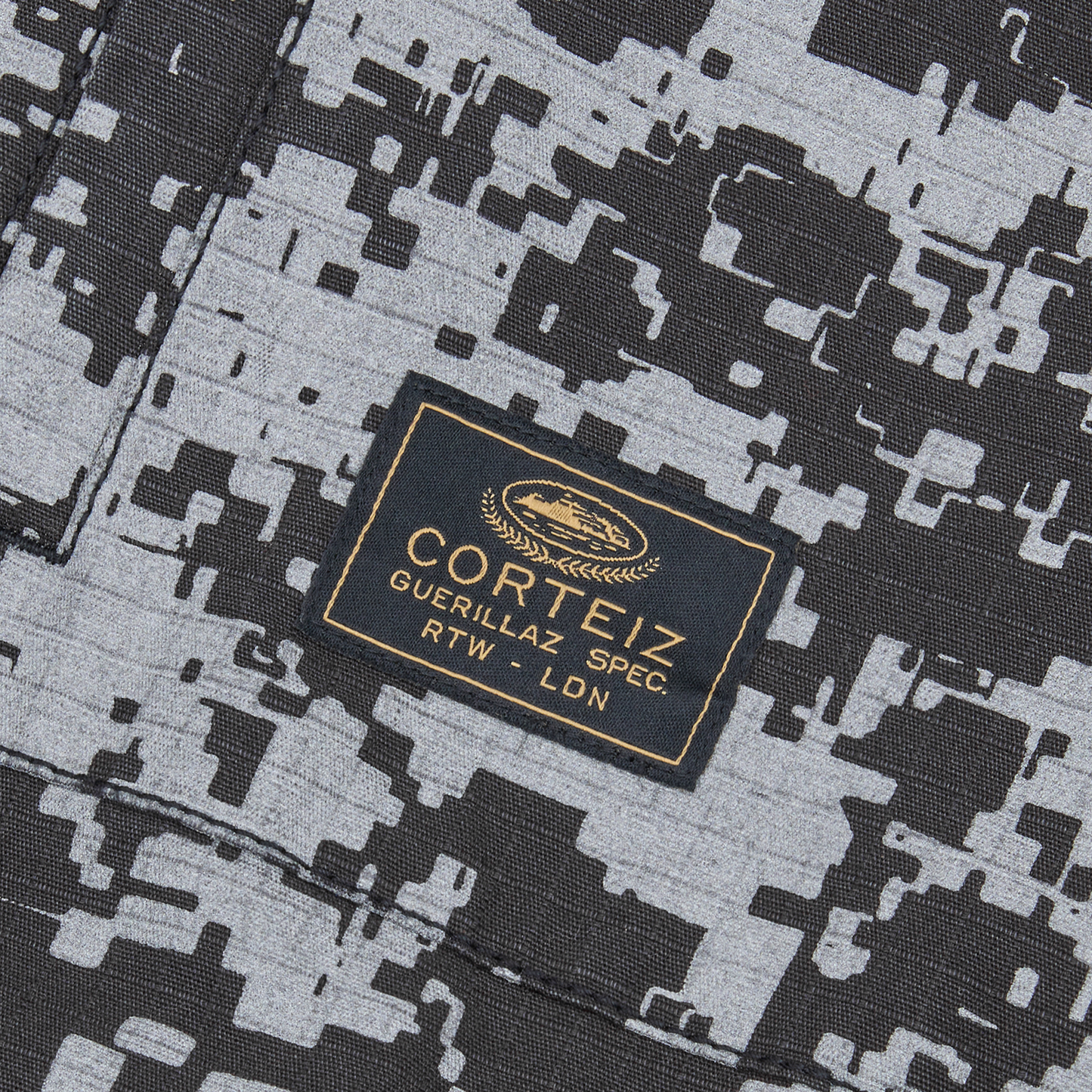 Corteiz Grey Ripstop Guerillaz Jacket, Reflective Camo, close-up of hood cord locks
