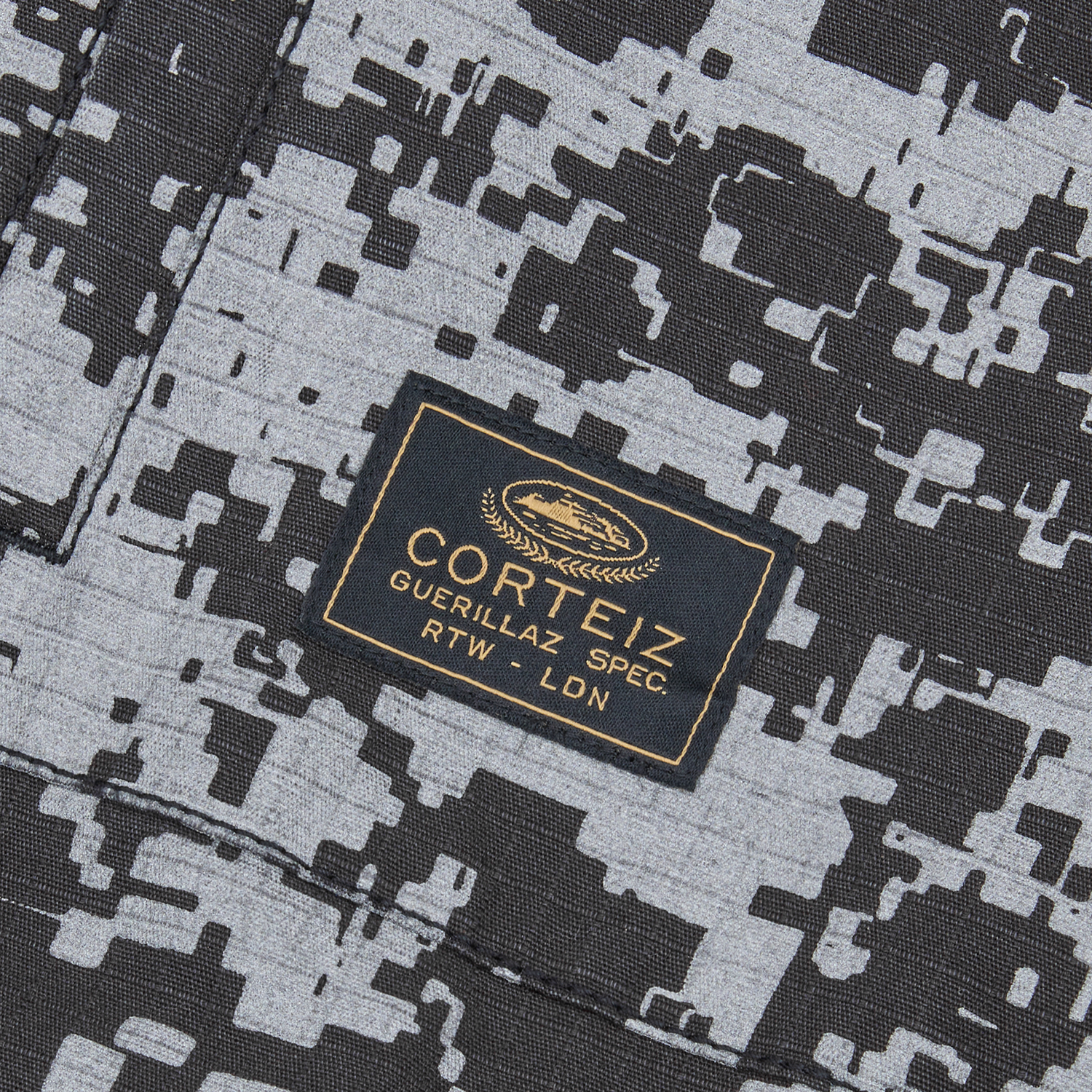 Corteiz Grey Ripstop Guerillaz Jacket, Reflective Camo, close-up of hood cord locks