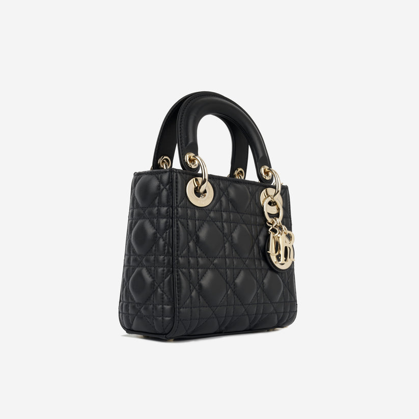 Side view of Dior Lady Dior Small Bag in Black Lambskin