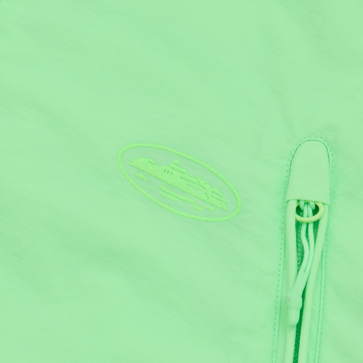 Corteiz Green Nylon Litework Quattro Jacket, close-up of tonal chest embroidery
