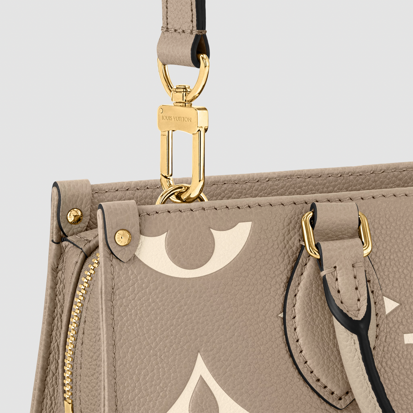 Louis Vuitton OnTheGo East West Dove Cream Monogram Empreinte Leather M23641