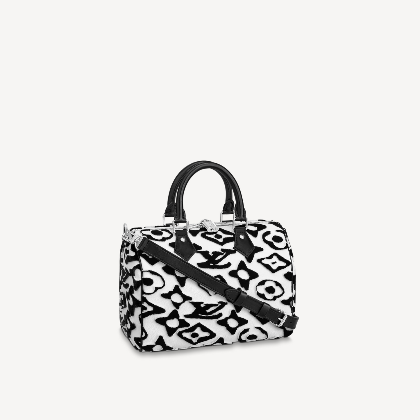 Black and white patterned handbag on a light gray background