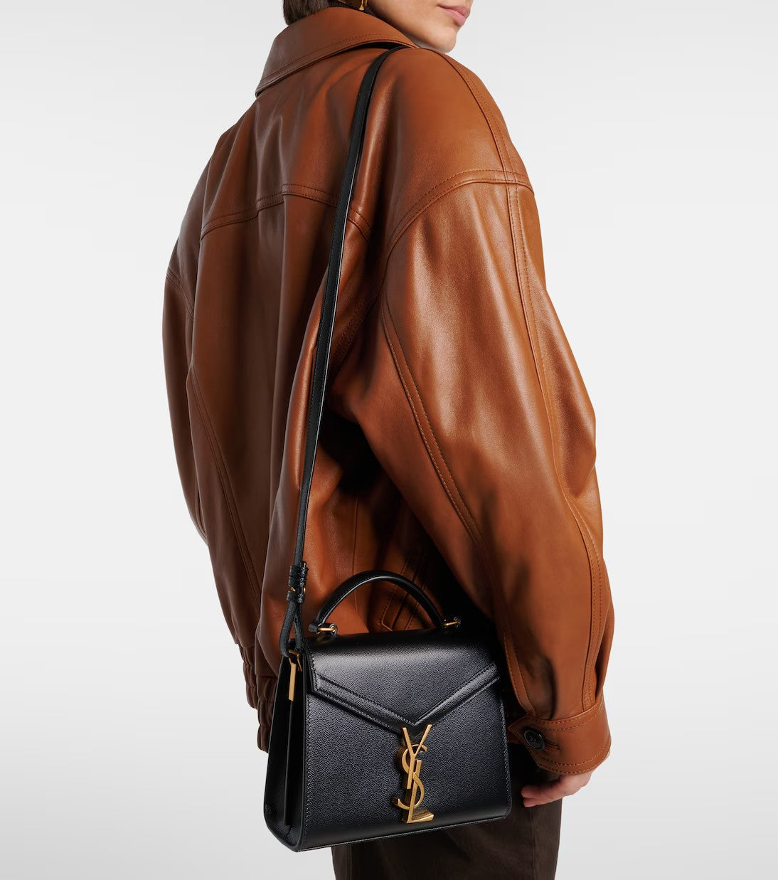 Saint Laurent Cassandra Mini bag in Black - detail view of top handle