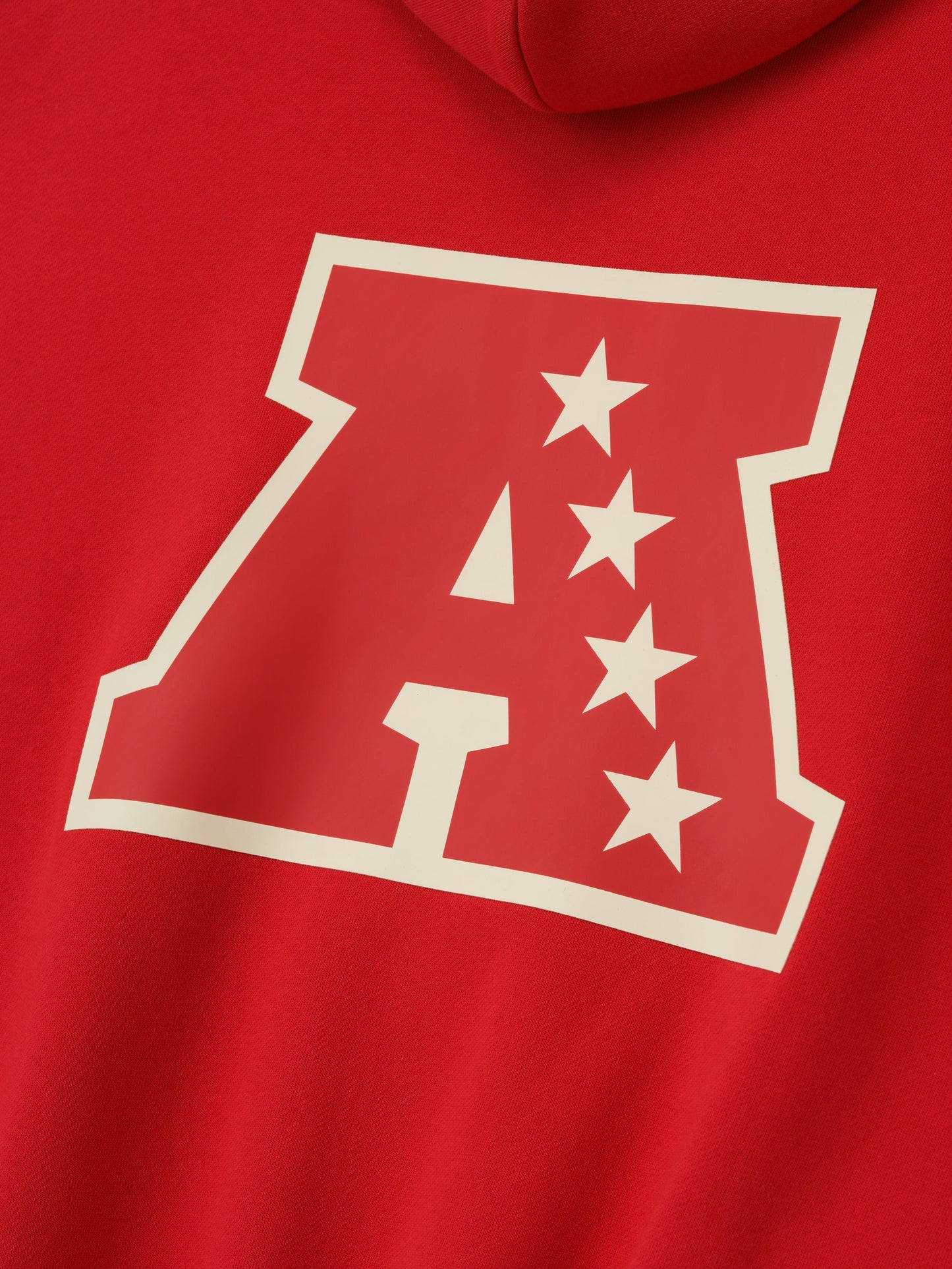 Red hoodie with a white logo featuring the letter 'A' and stars on a red background