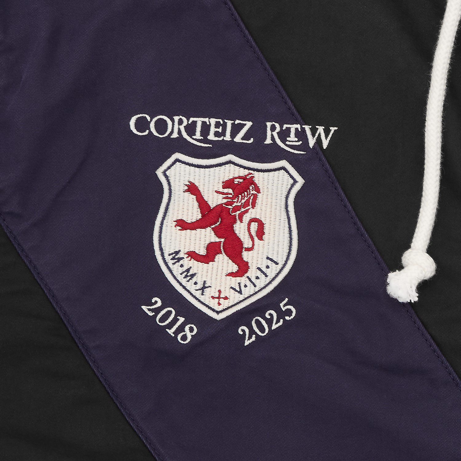 Corteiz Black Cotton Poly Shield Crest Twill Jacket, close-up of patch pocket on left shoulder