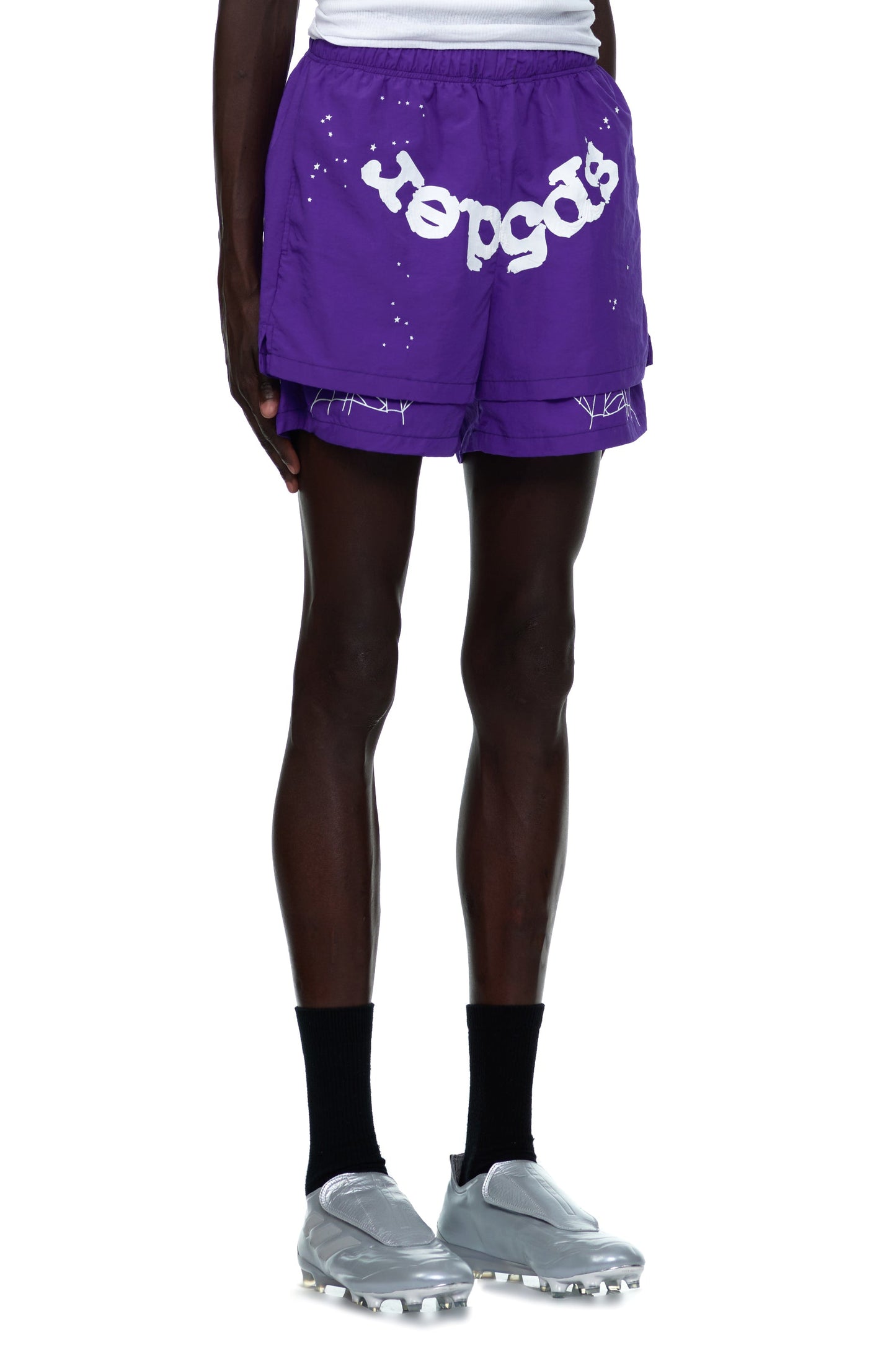 Detail view of logo and star print on SP5DER Grape Logo Short in Purple