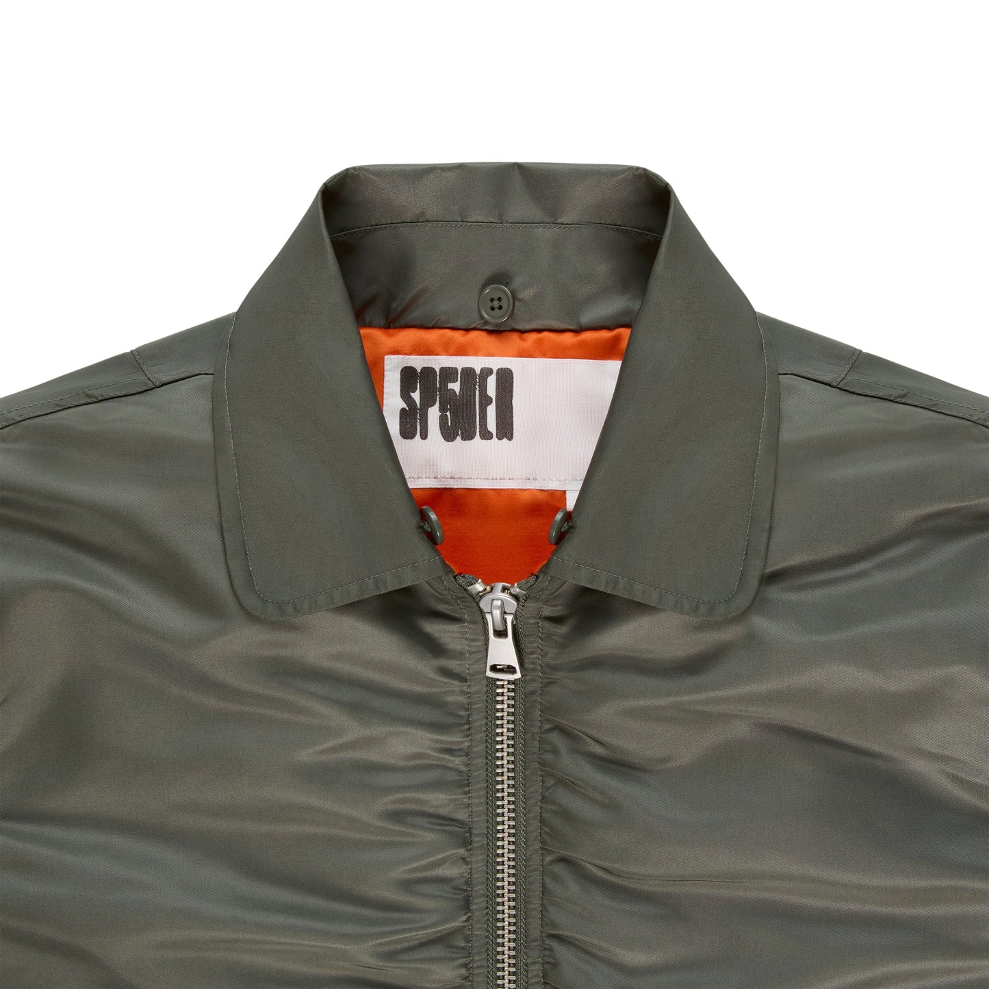 Detail view of snap-button flap pockets on SP5DER Flight Jacket in Army Green