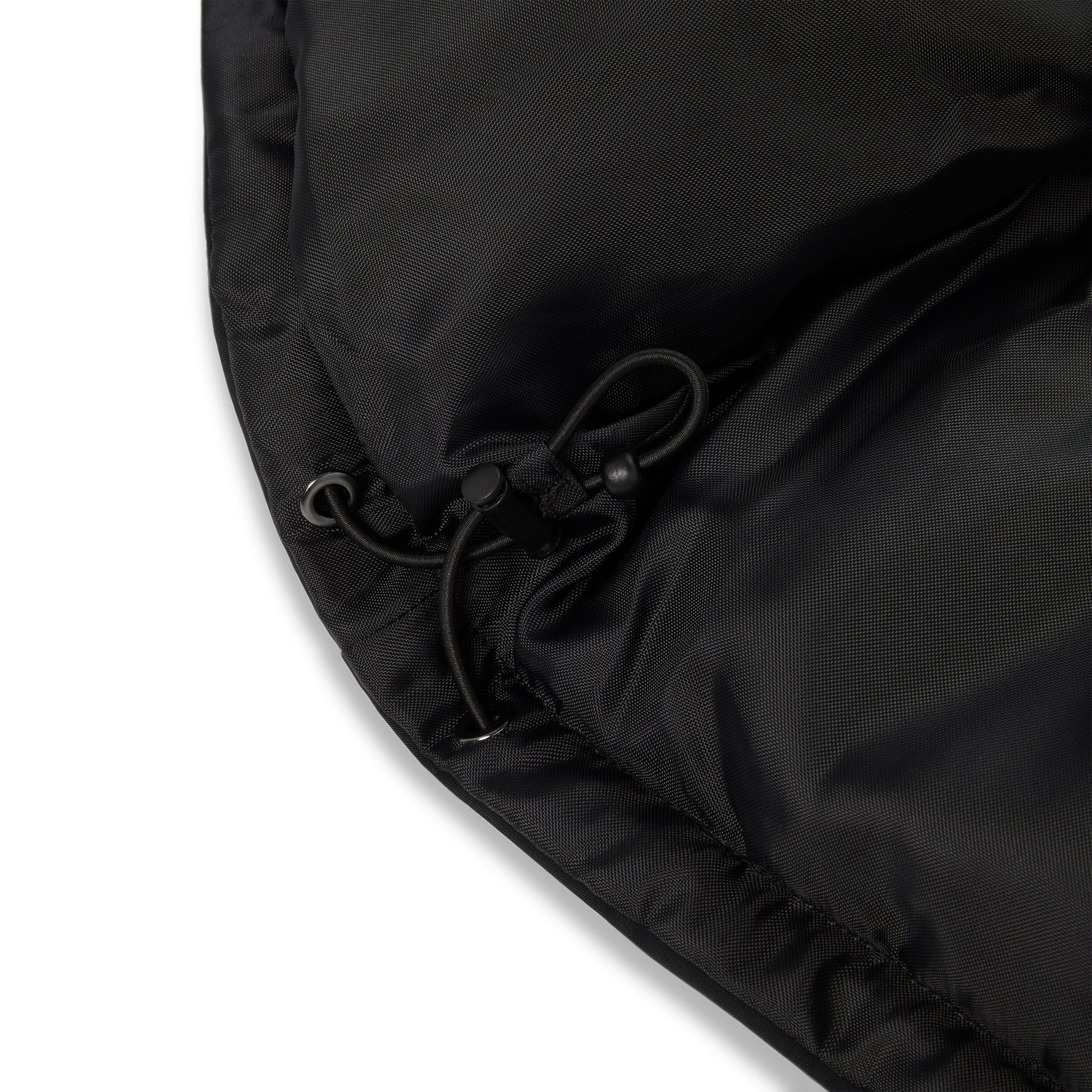Side view of SP5DER Trackhawk Puffer Jacket in Black