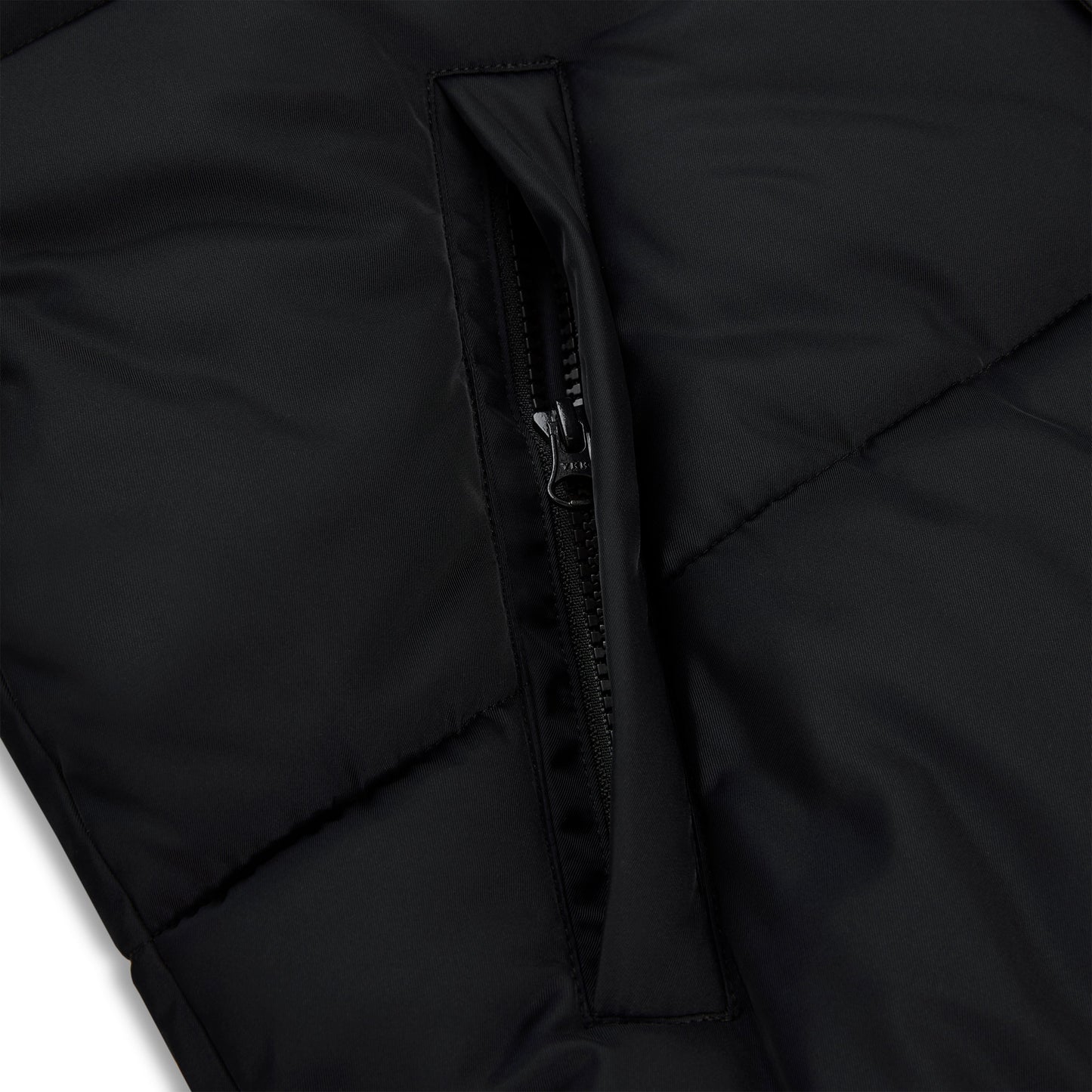 Detail view of side pockets on SP5DER Trackhawk Puffer Jacket in Black