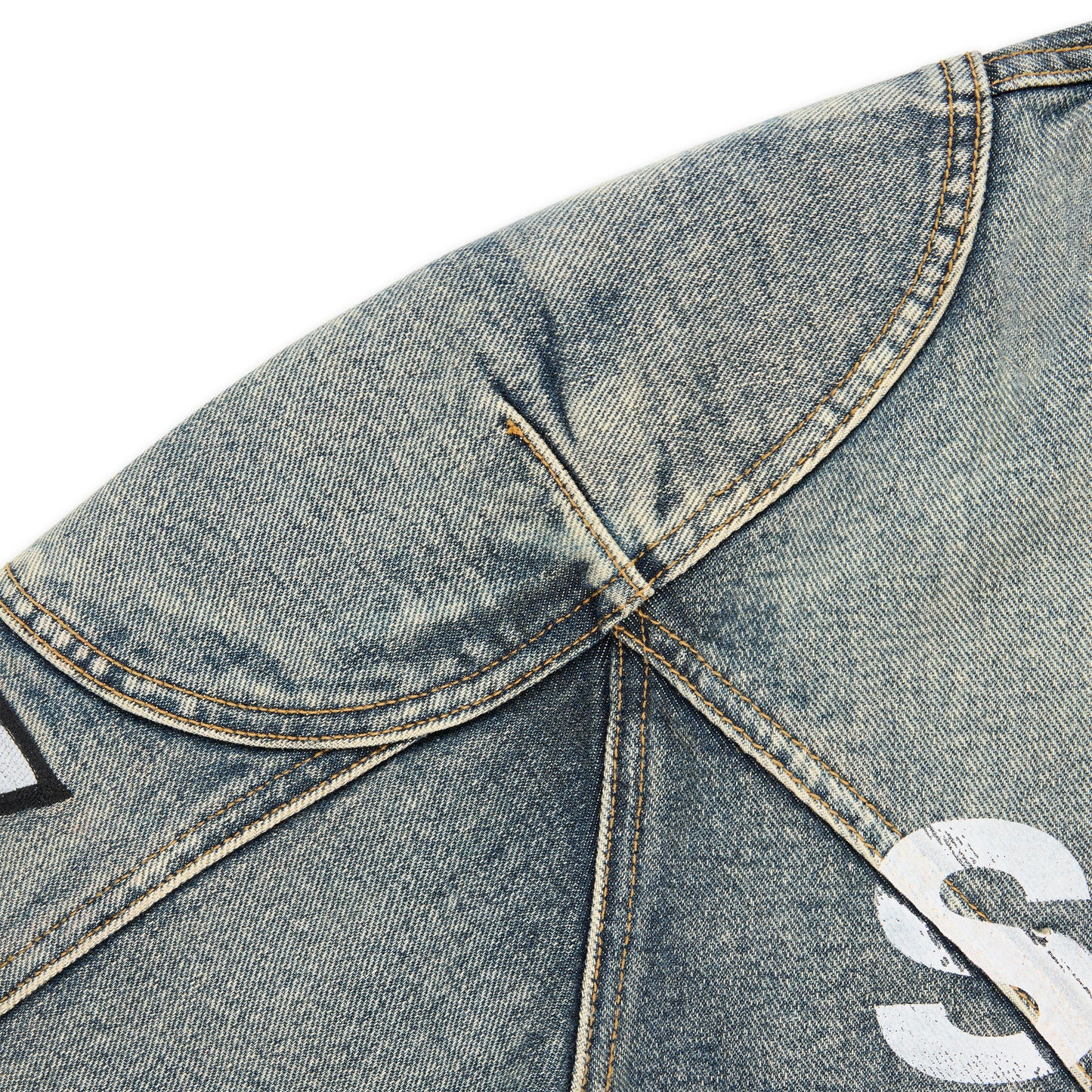 Side view of SP5DER Motorsport Denim Jacket in Indigo