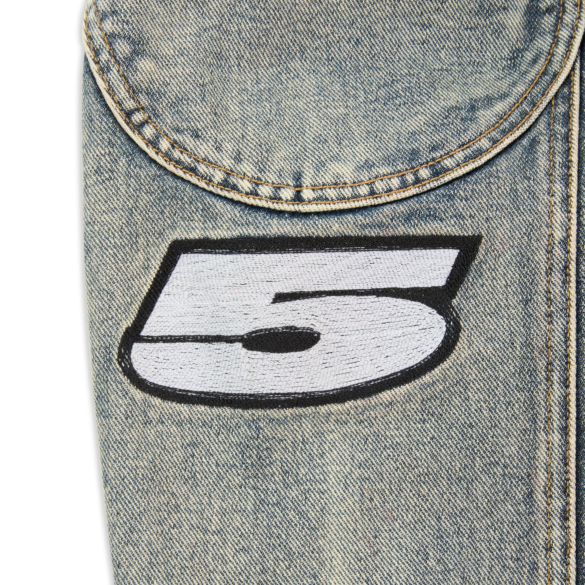 Full look front view of SP5DER Motorsport Denim Jacket in Indigo