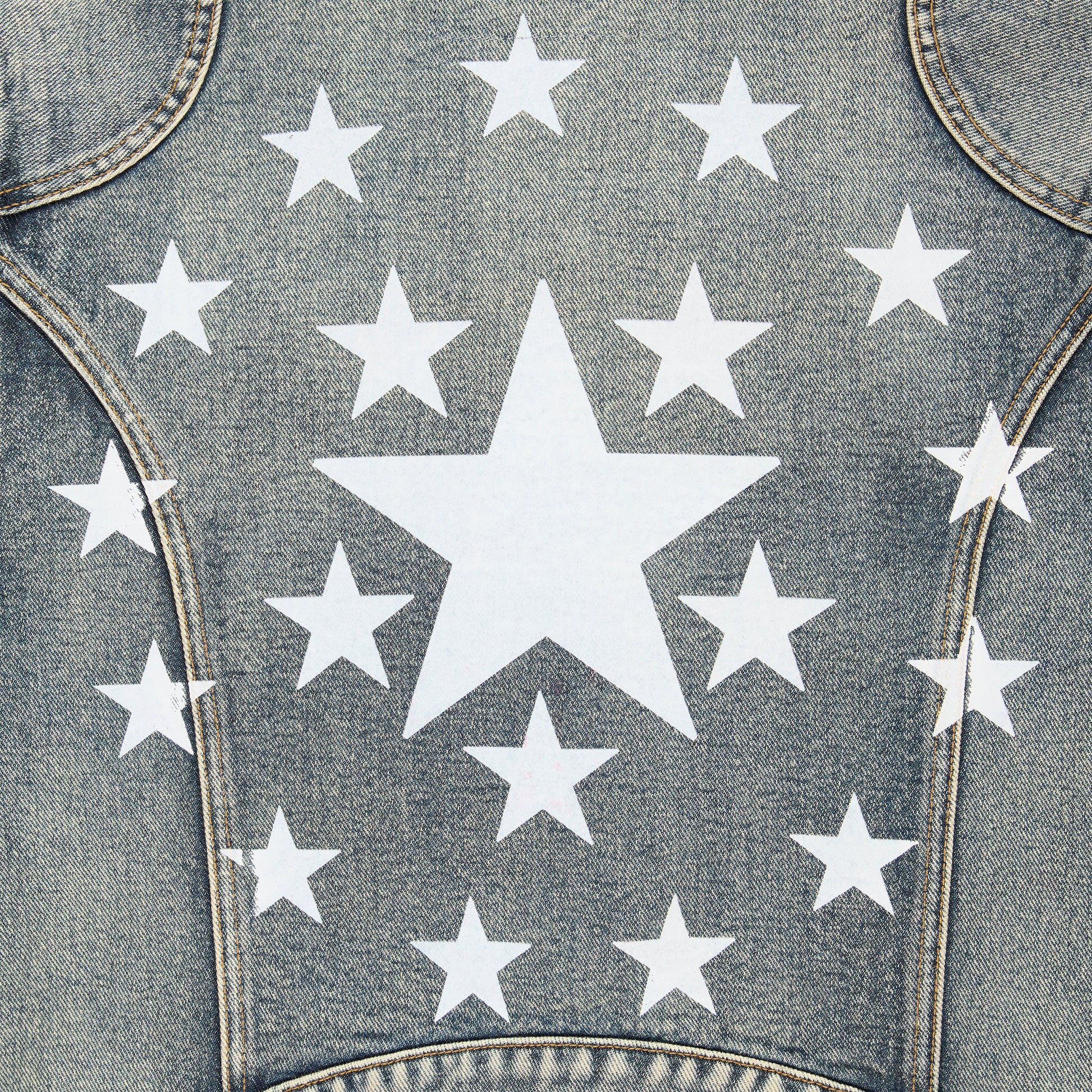 Detail view of arm patches on Motorsport Denim Jacket in Indigo