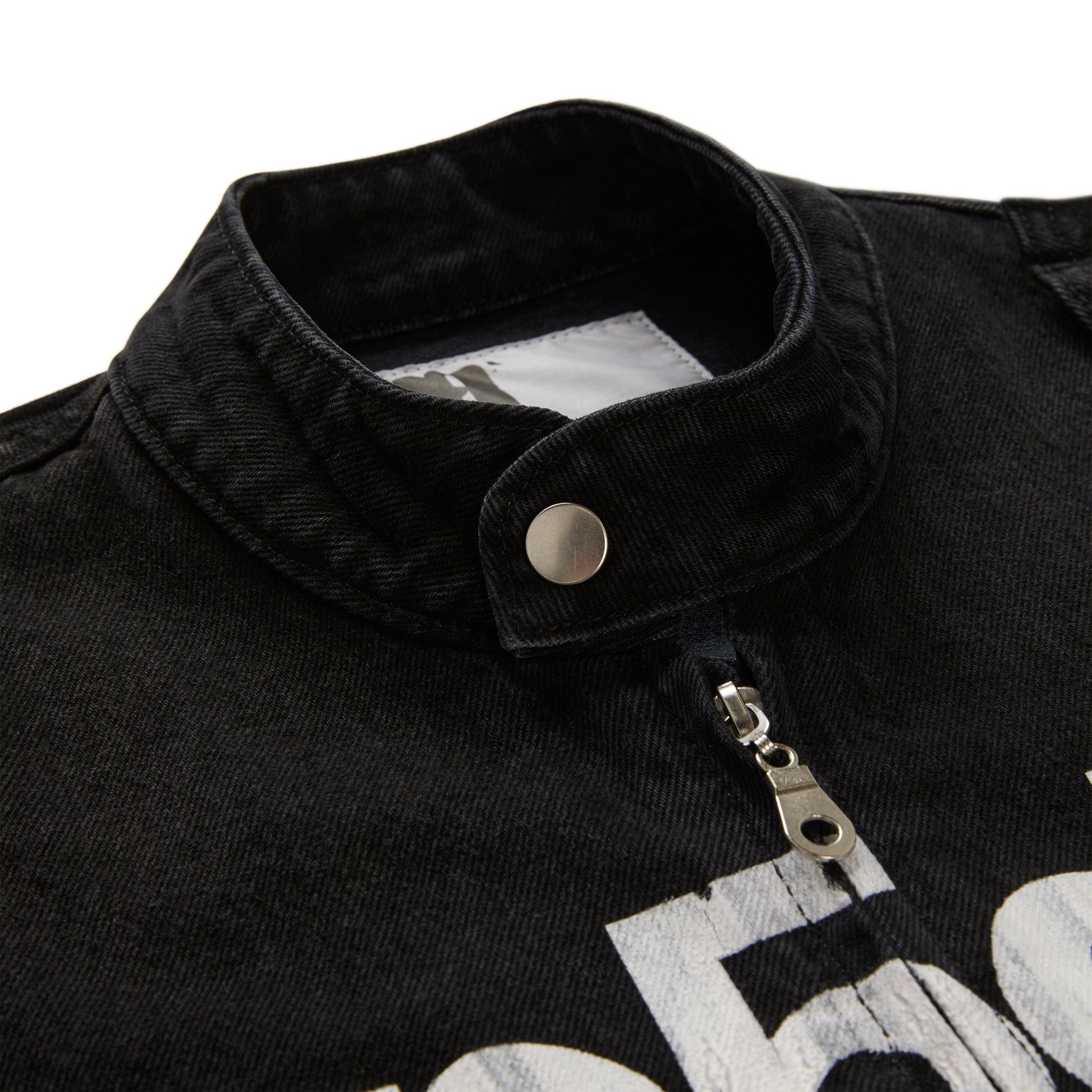 Detail view of star print on back of Motorsport Denim Jacket in Black