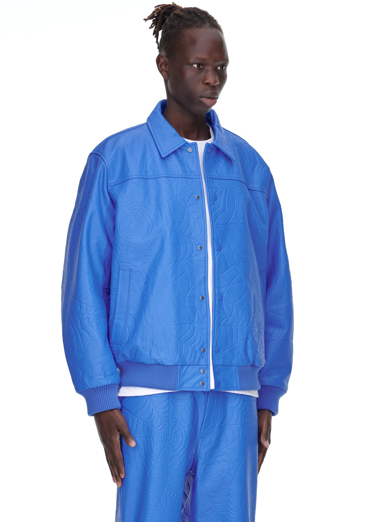 Side view of SP5DER Debossed Web Leather Jacket in Blue