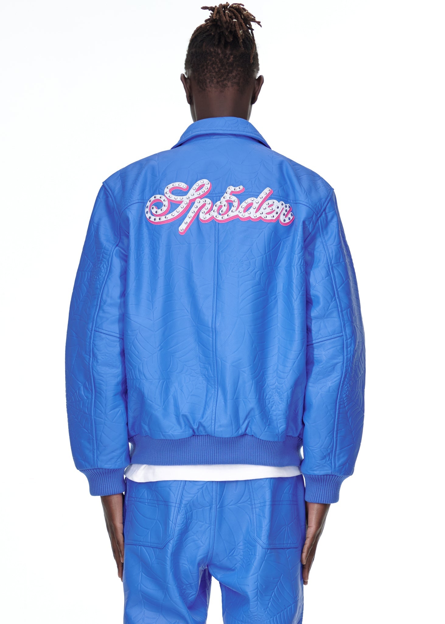 Close-up view of collar on SP5DER Debossed Web Leather Jacket in Blue