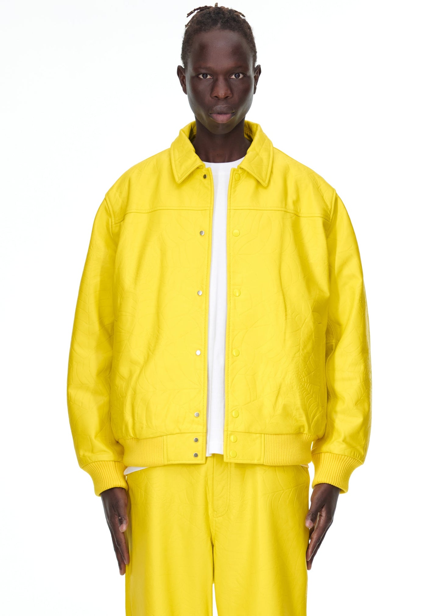 Additional angle view of SP5DER Debossed Web Leather Jacket in Yellow