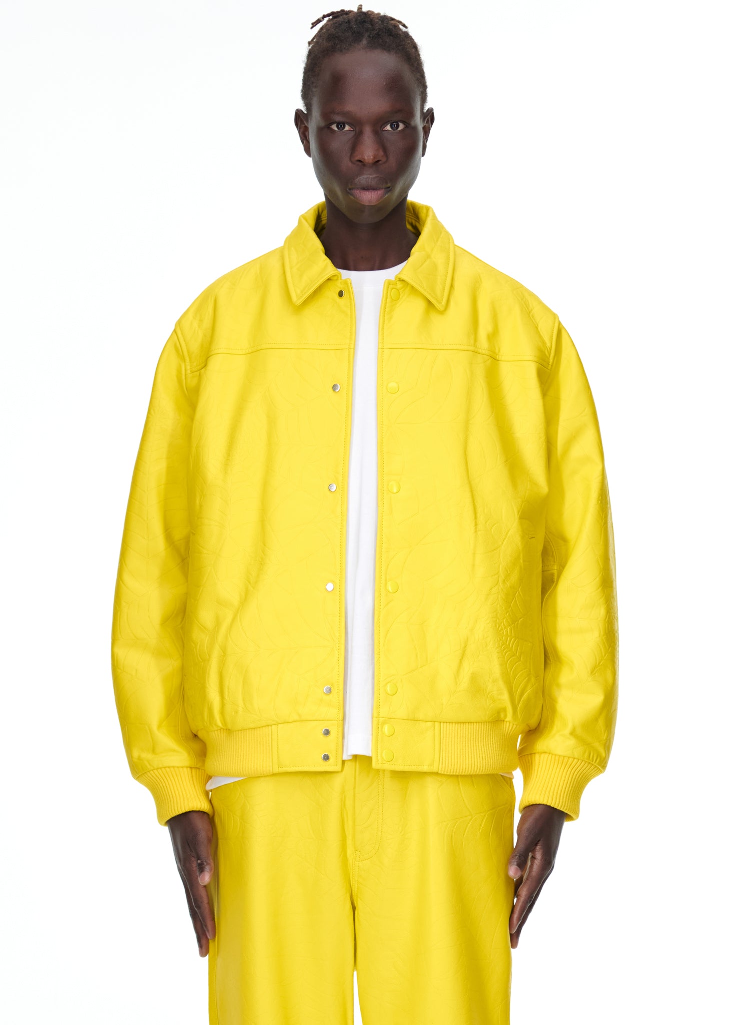 Additional angle view of SP5DER Debossed Web Leather Jacket in Yellow