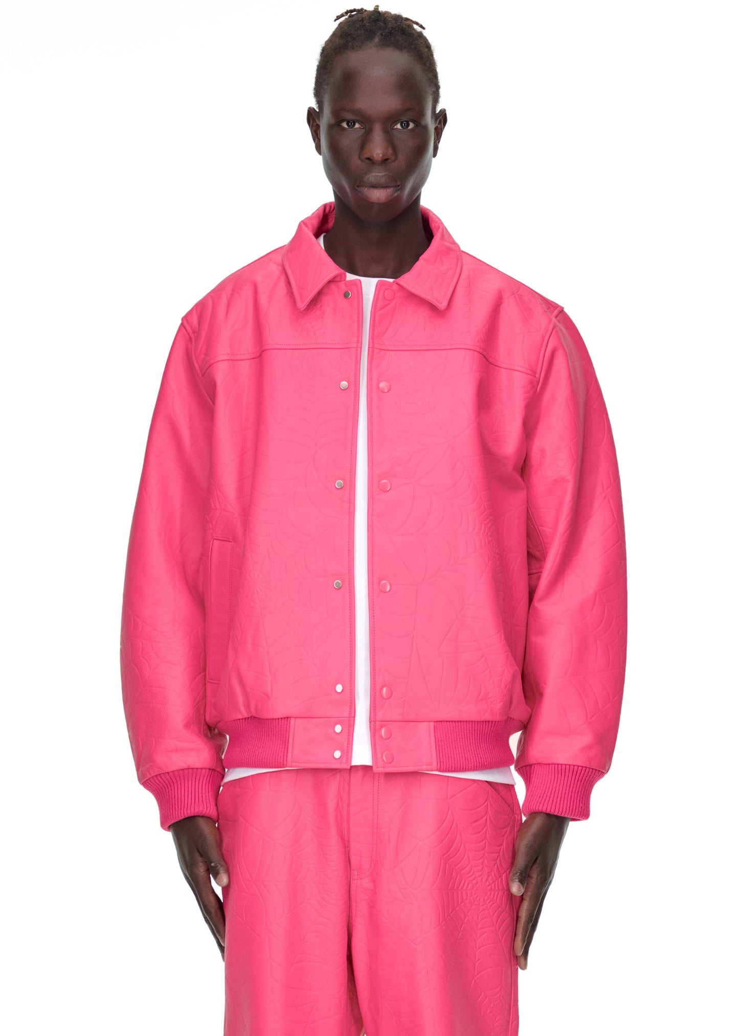 Additional angle view of SP5DER Debossed Web Leather Jacket in Pink