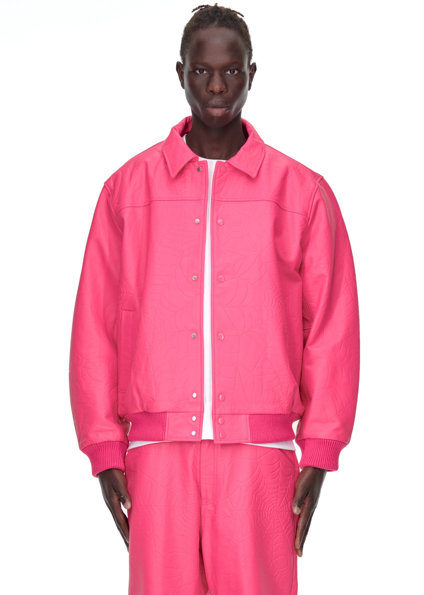 Additional angle view of SP5DER Debossed Web Leather Jacket in Pink