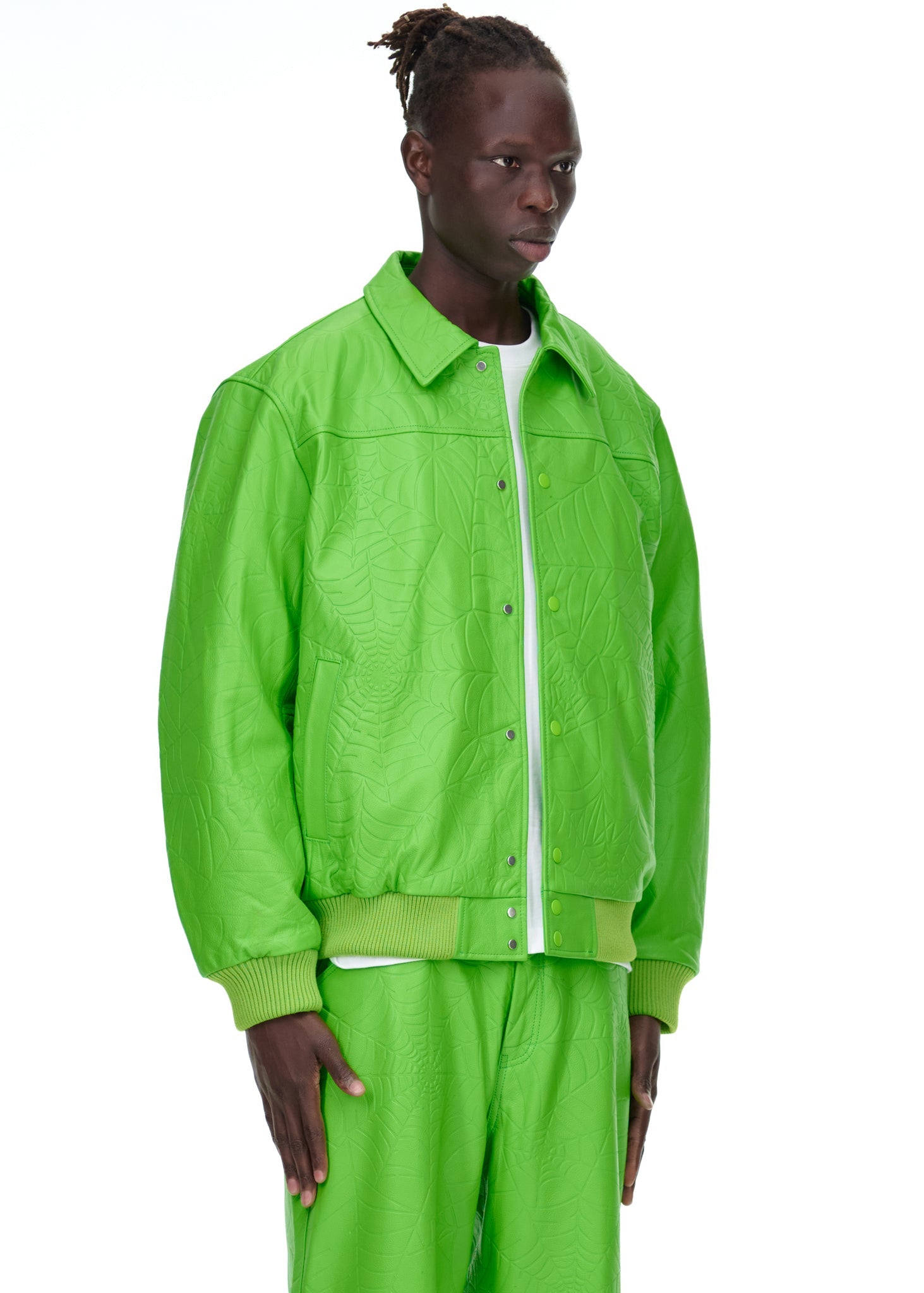 Side view of SP5DER Debossed Web Leather Jacket in Green