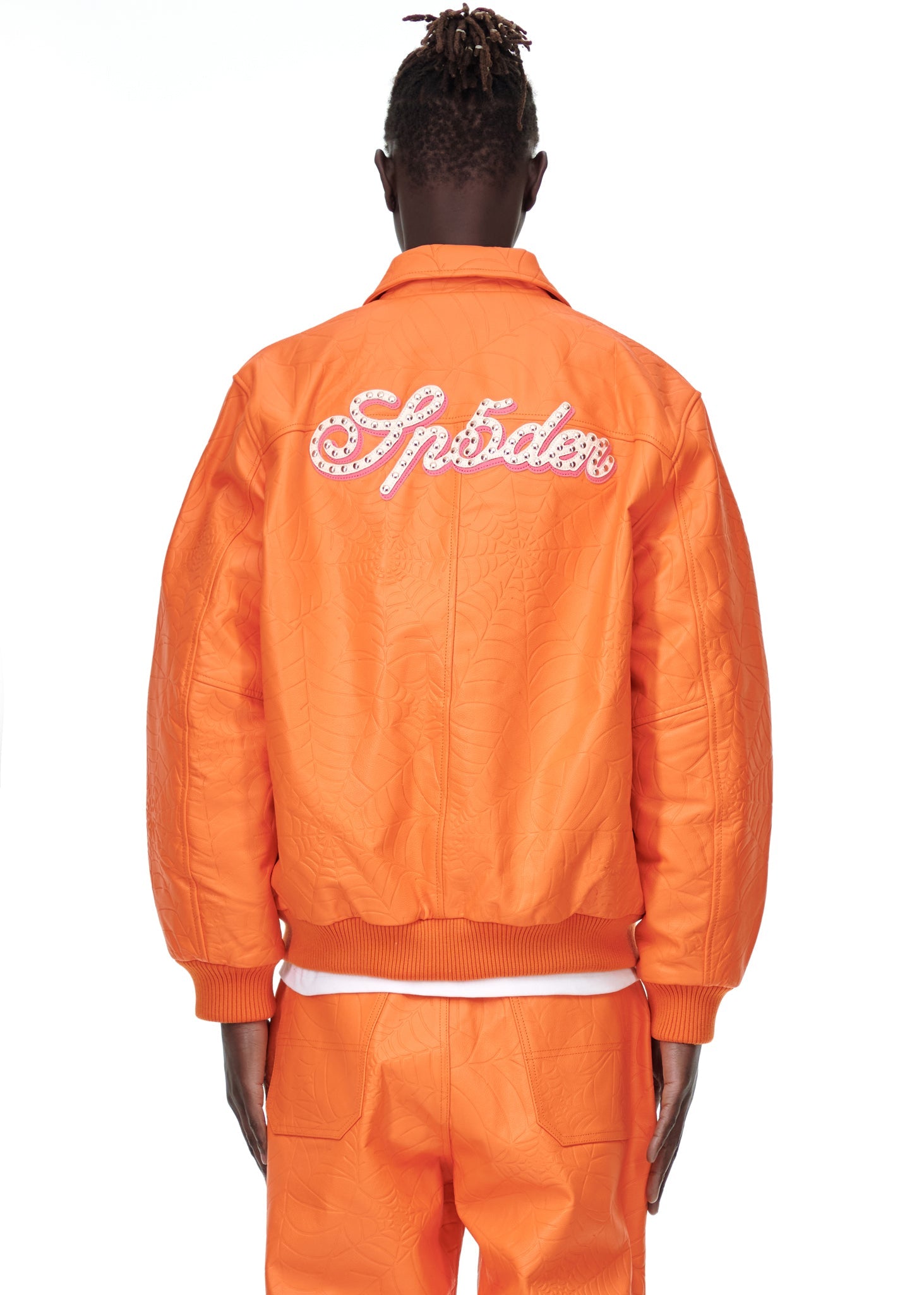 Close-up view of collar on SP5DER Debossed Web Leather Jacket in Orange