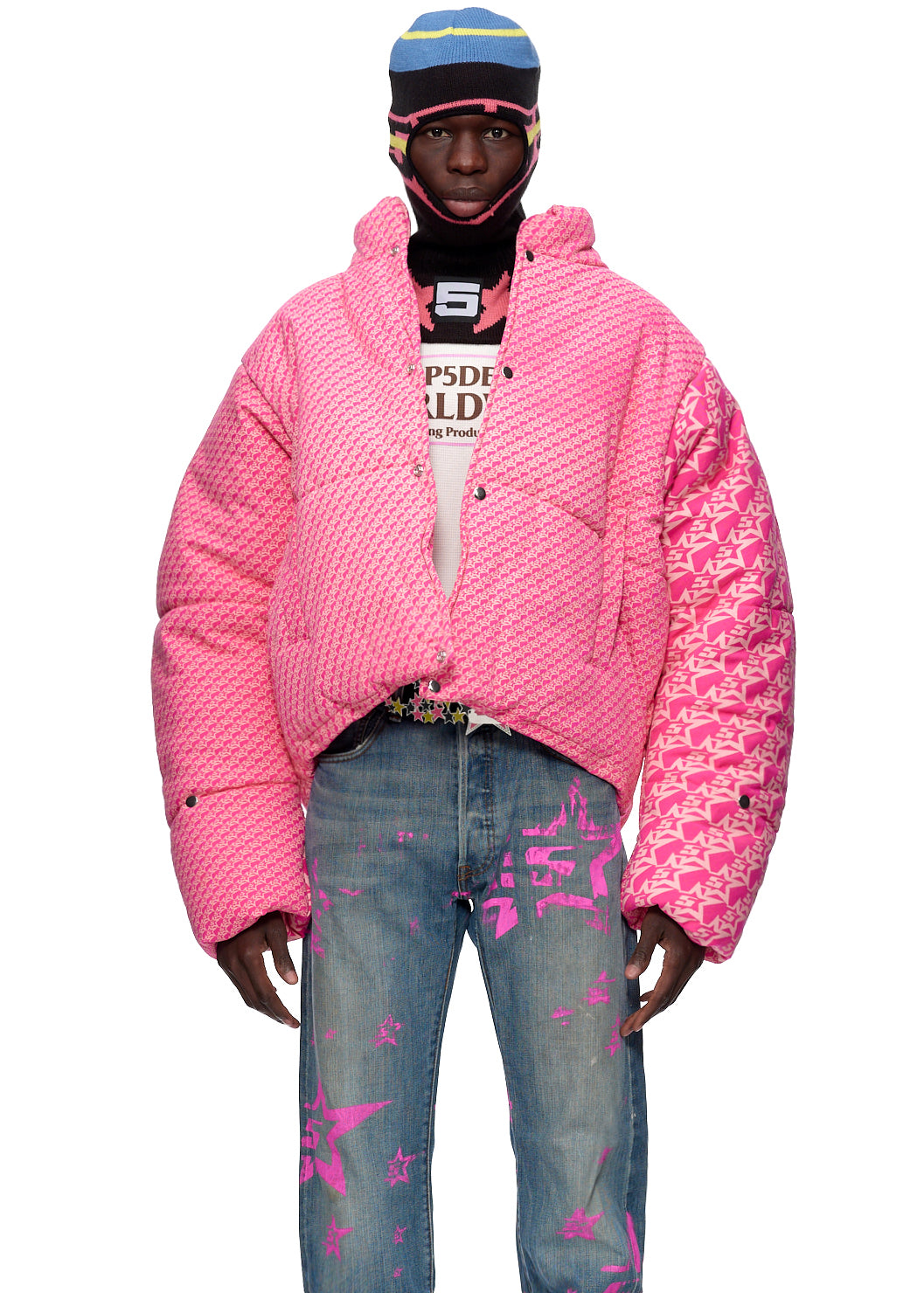 Detail view of fabric texture on SP5DER 5Star Puffer Jacket in Pink