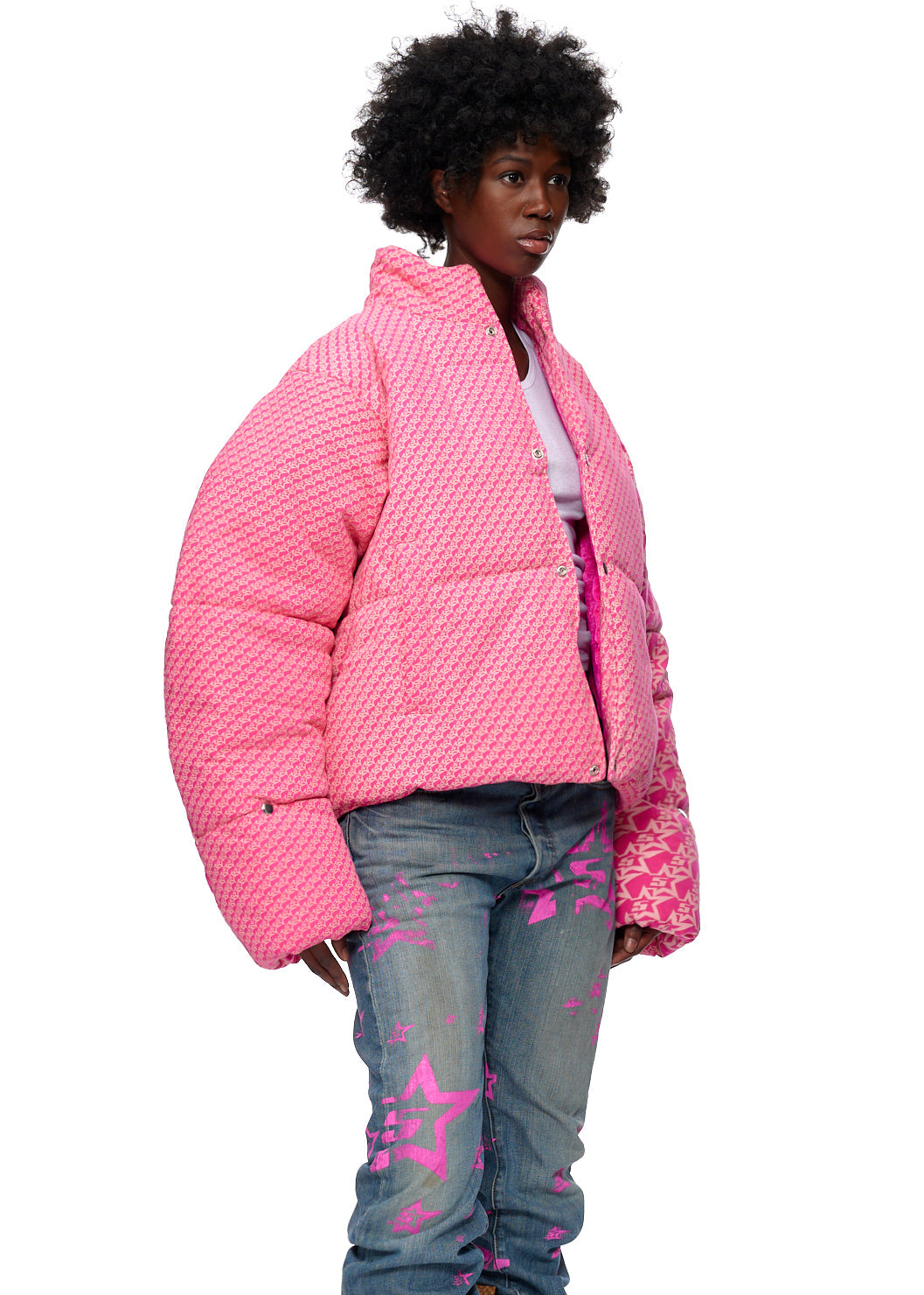 Side view of SP5DER 5Star Puffer Jacket in Pink