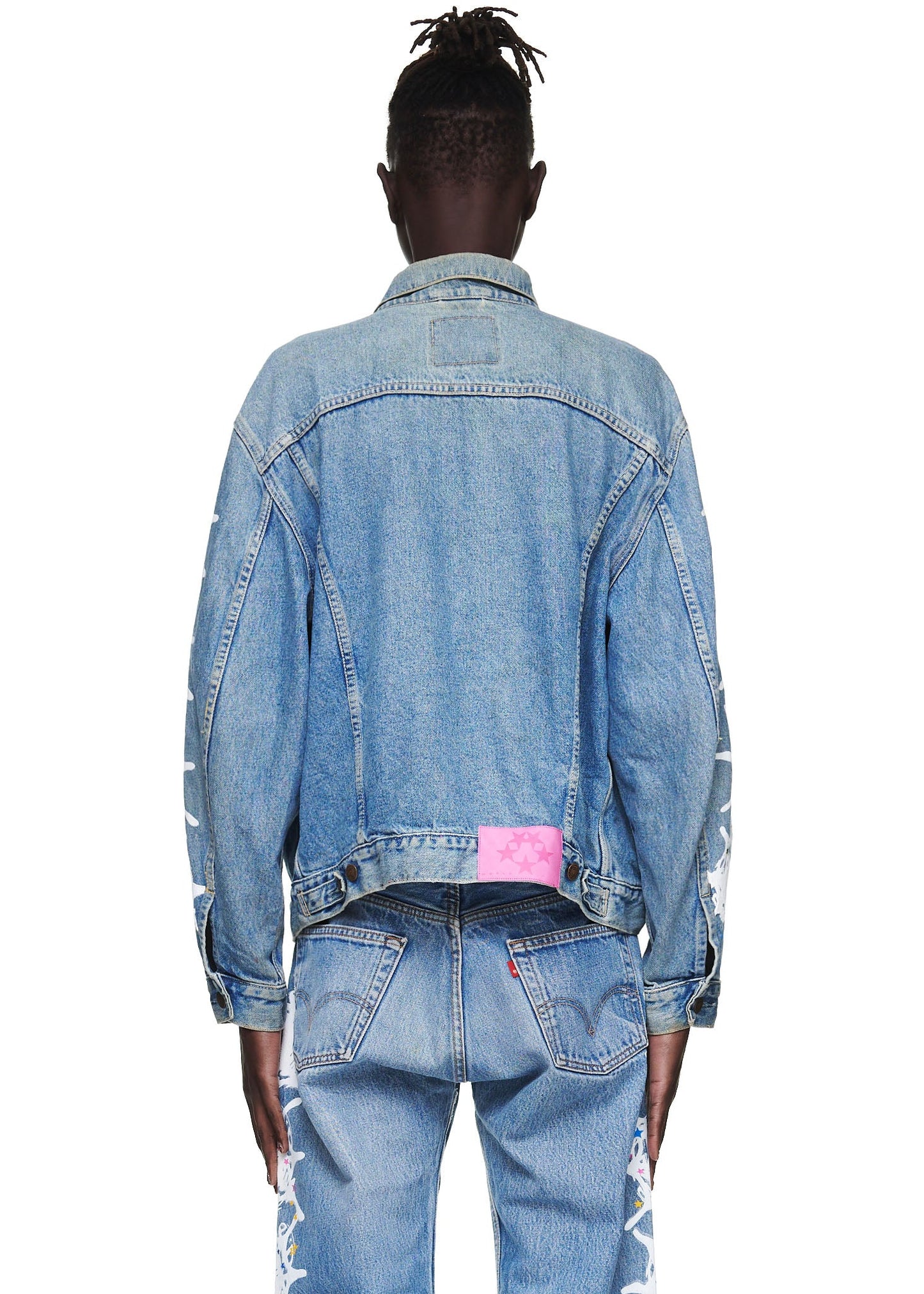 Side view of SP5DER Vintage Web Denim Trucker Jacket in Blue
