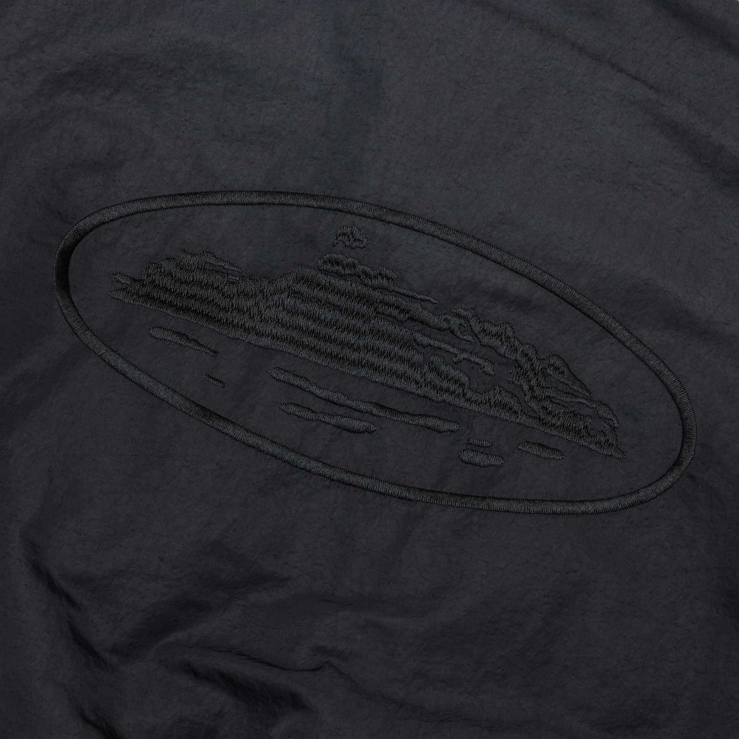 Corteiz Black Nylon Alcatraz Bomber Jacket, Vintage Black, close-up of patch pockets