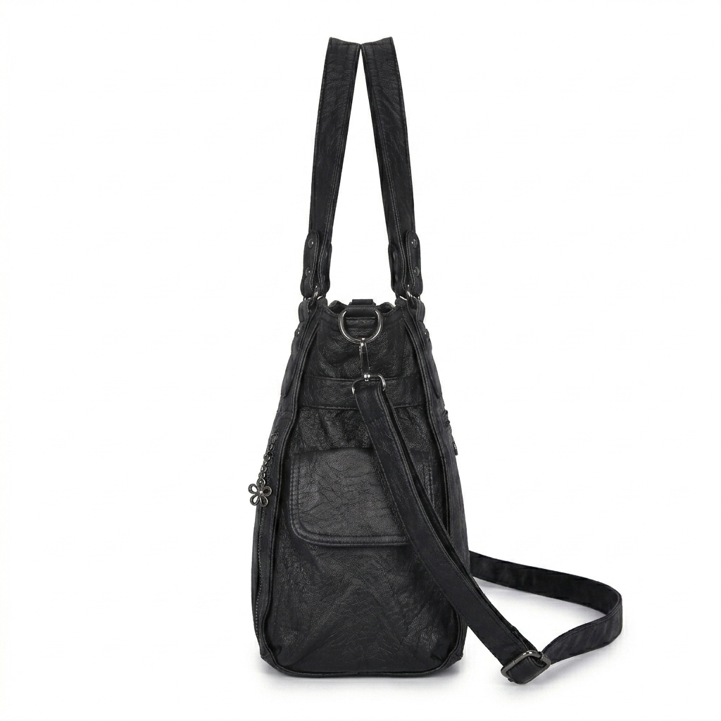 Black backpack with straps on a white background