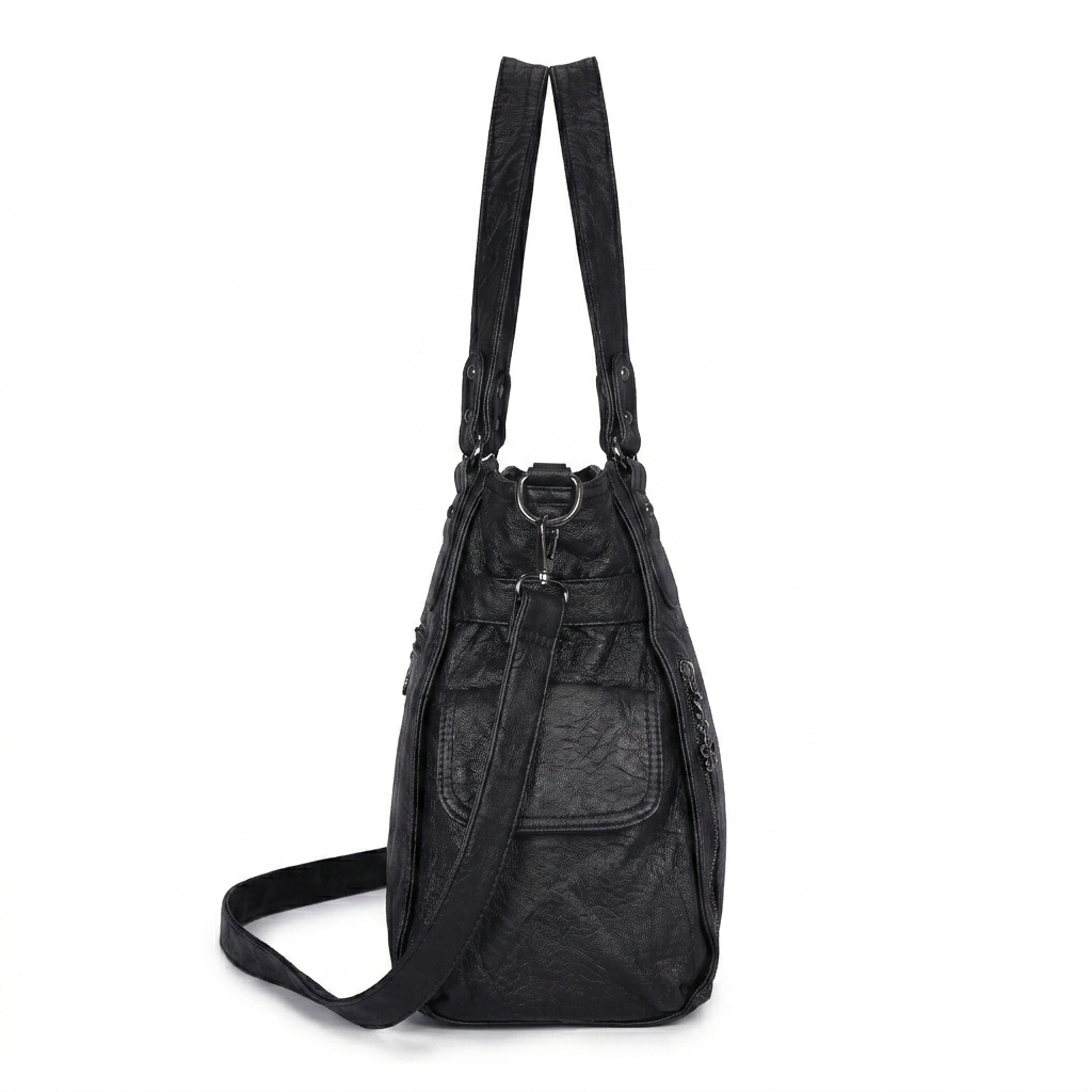 Black backpack with straps on a white background
