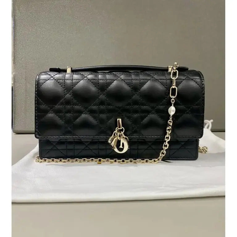 Detail view of hardware on Dior Miss Dior Top Handle Bag 24cm in Black Lambskin