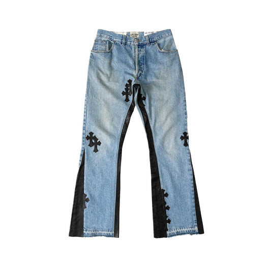 Chrome Hearts Blue Cotton Denim Flare Jeans, Gallery Dept collaboration, front view showing flared silhouette and cross patch detail
