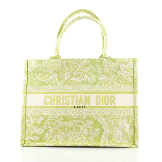 Front view of the Christian Dior Book Tote in green canvas