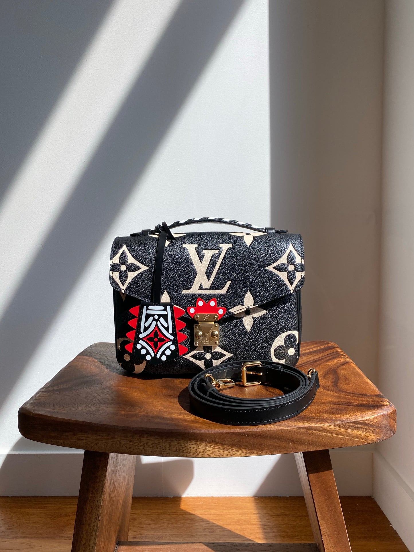 Louis Vuitton LV Crafty Pochette Metis Black Embossed Leather M45385