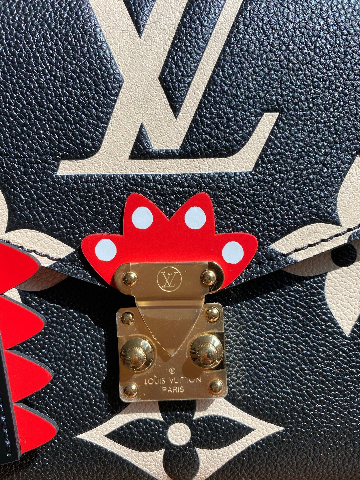 Louis Vuitton LV Crafty Pochette Metis Black Embossed Leather M45385