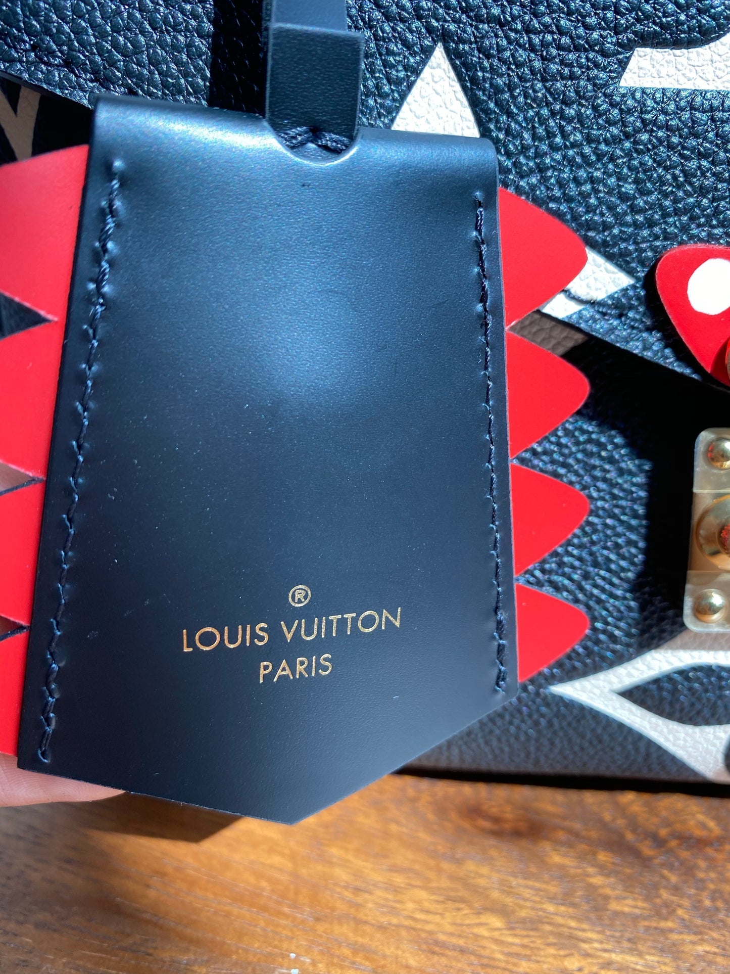 Louis Vuitton LV Crafty Pochette Metis Black Embossed Leather M45385