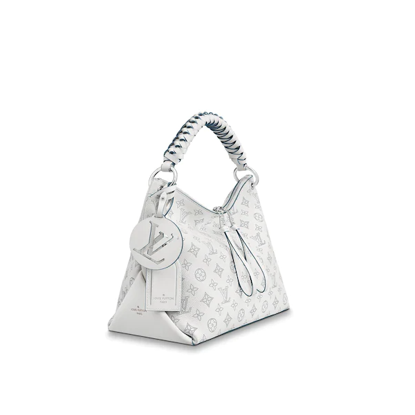 A close-up of the Monogram perforations on the bag's leather