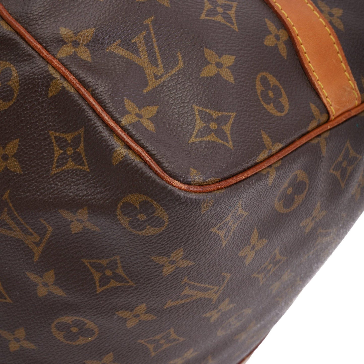 A profile view of the bag with its sides cinched