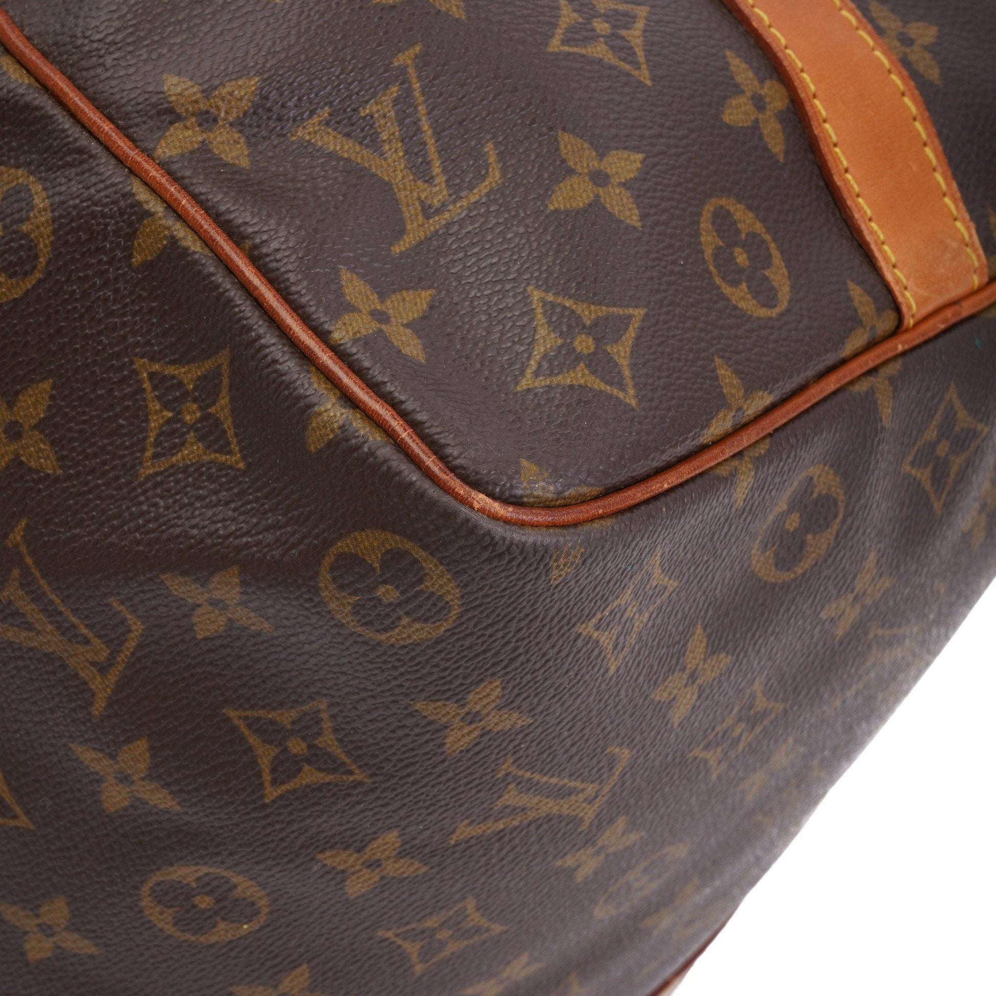 A profile view of the bag with its sides cinched