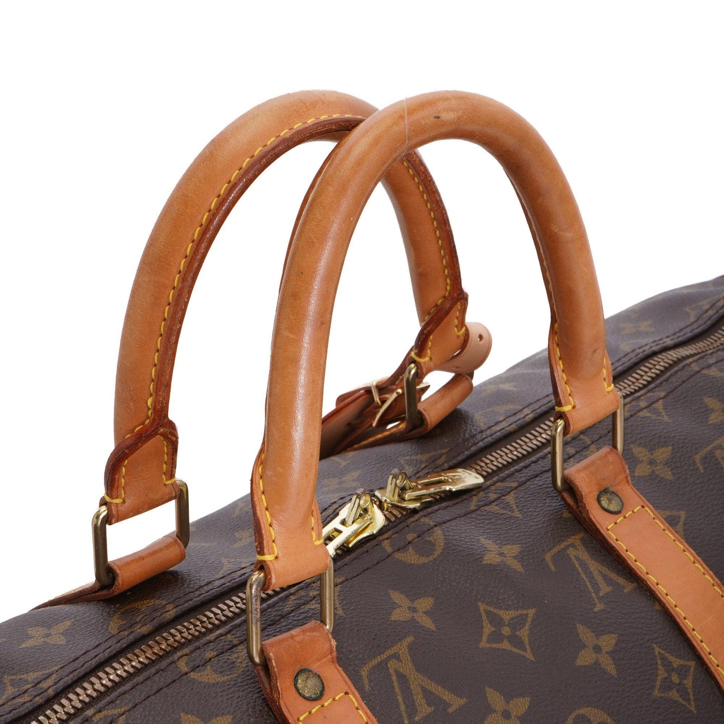 A close-up of the rolled leather handles