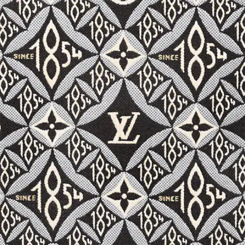 A macro shot of the Monogram and 1854 jacquard pattern