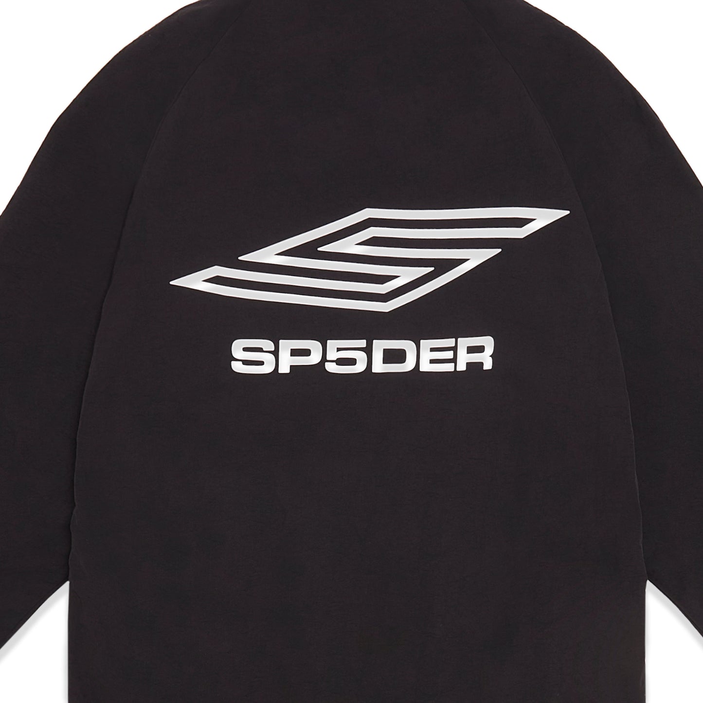Detail view of contrast zip closure on SP5DER Pro Windbreaker in Black