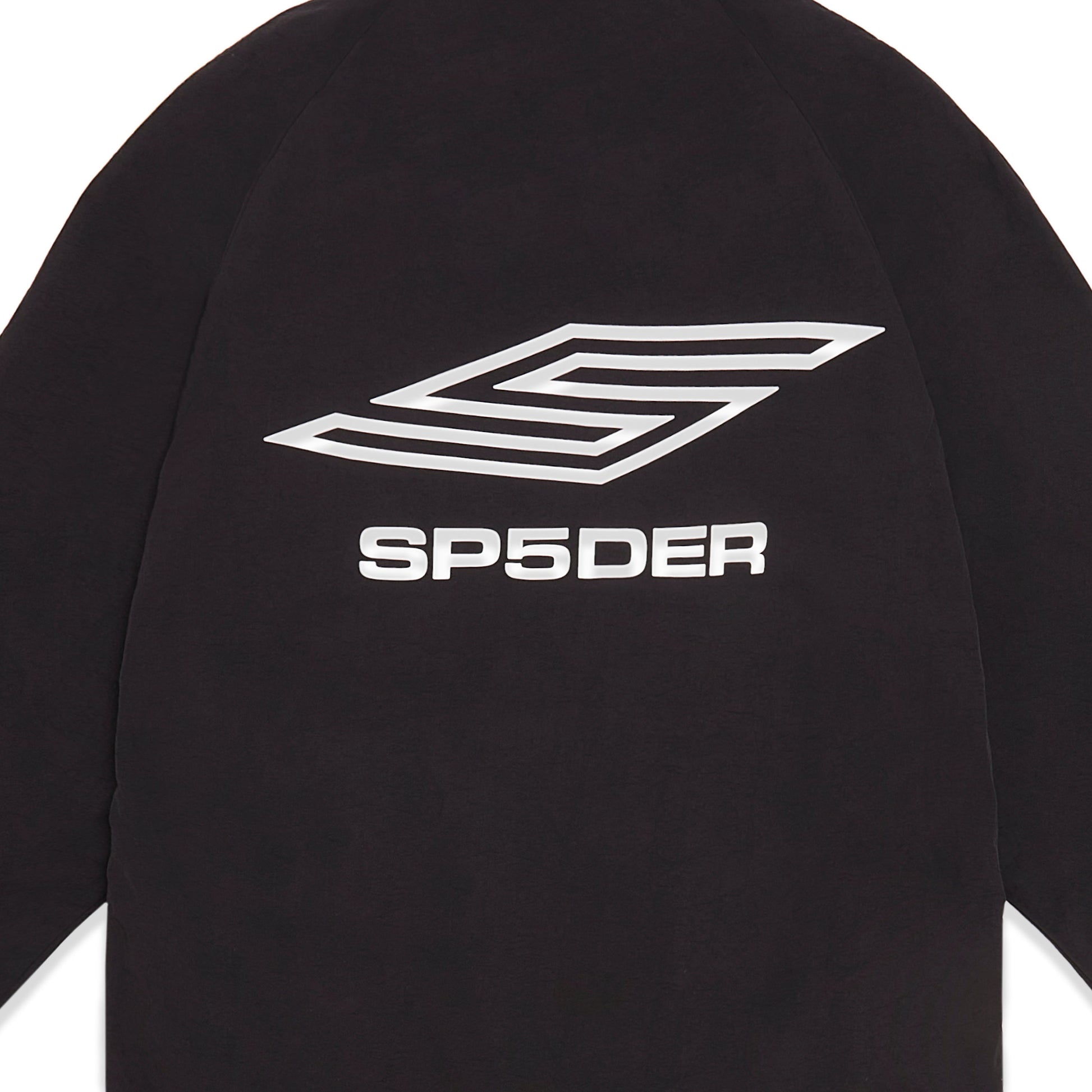 Detail view of contrast zip closure on SP5DER Pro Windbreaker in Black