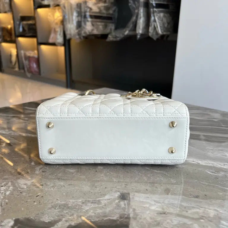Detail view of hardware on Dior Medium Lady Dior Bag in White
